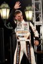 Dan Wheldon is introduced during an event on the Las Vegas Boulevard Strip as a preview to the IndyCar World Series Championship on October 13. Wheldon was killed Sunday in a fiery, 15-car crash at the Las Vegas 300 IndyCar series finale