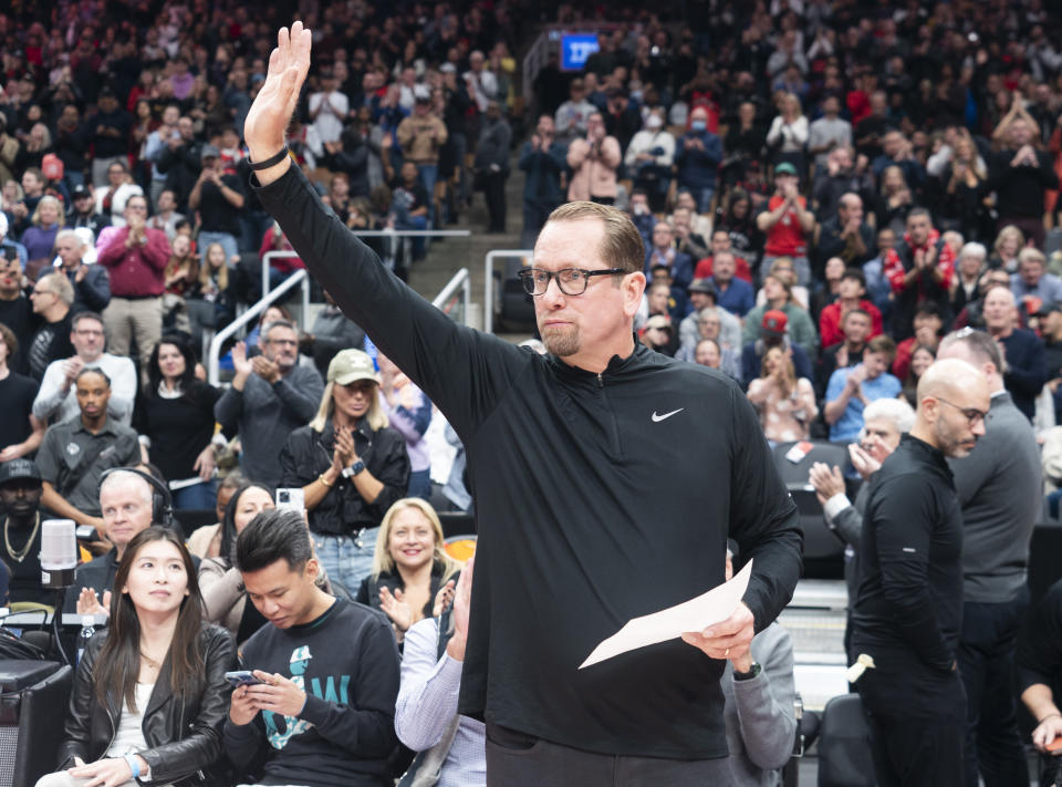 TORONTO, ON - OCTOBER 28: Nick Nurse coach of the Philadelphia 76ers salutes the crowd after a video tribute was played for the time he coached the Toronto Raptors in a break in play during the first half of their basketball game at the Scotiabank Arena on October 28, 2023 in Toronto, Ontario, Canada. NOTE TO USER: User expressly acknowledges and agrees that, by downloading and/or using this Photograph, user is consenting to the terms and conditions of the Getty Images License Agreement. (Photo by Mark Blinch/Getty Images)