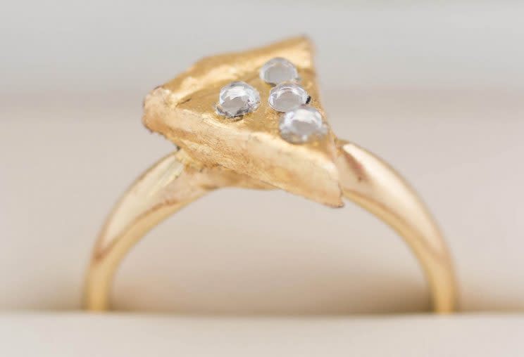 Who wouldn't want a pizza shaped engagement ring? [Photo: Dominos]