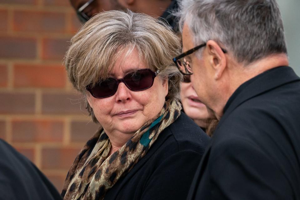 Julia Amess the widow of Conservative MP Sir David Amess, looks towards the Rev Clifford Newman of Belfairs Methodist Church (PA)