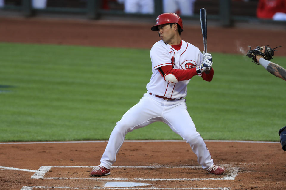 Cincinnati Reds' Shogo Akiyama reacts to a pitch as he bats in the first inning during a baseball game against the Milwaukee Brewers in Cincinnati, Monday, Sept. 21, 2020. (AP Photo/Aaron Doster)