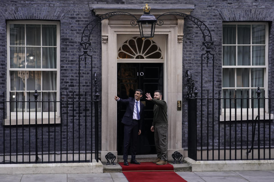 Britain's Prime Minister Rishi Sunak, left, gestures as he welcomes Ukraine's President Volodymyr Zelenskyy at Downing Street in London, Wednesday, Feb. 8, 2023. It is the first visit to the UK by the Ukraine President since the war began nearly a year ago. (AP Photo/Alberto Pezzali)