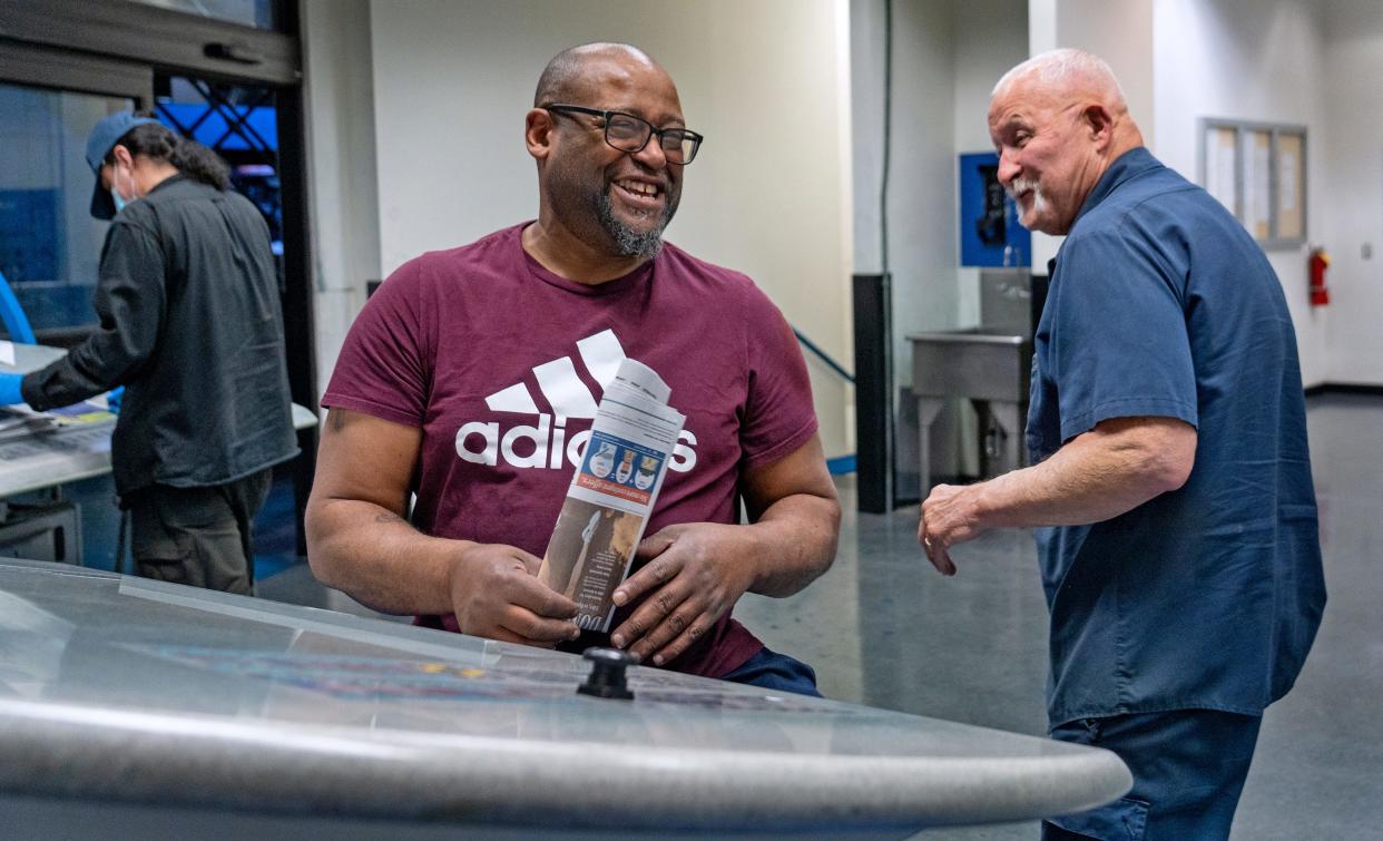 After 34 years in the printing industry, press operator Andre Dixon (left) has decided it's time to change careers. "I've been through this already a couple of times," he said Sunday night as he put out the final IndyStar. "I think I'm done with it. I'm going to do some HVAC work now."