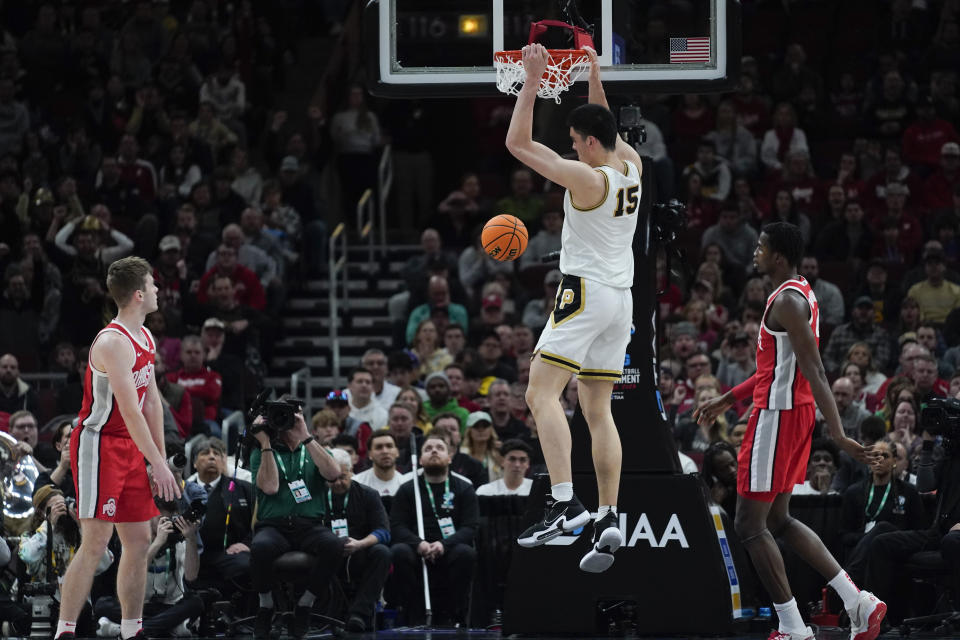 Purdue's Zach Edey (15) dunks during the second half of an NCAA semifinal basketball game against Ohio State at the Big Ten men's tournament, Saturday, March 11, 2023, in Chicago. (AP Photo/Erin Hooley)