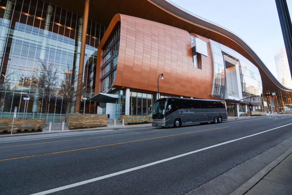A Vonlane motor-coach drives past the Music City Center in downtown Nashville, Tenn. The transportation company will launch a new route between Nashville and Memphis beginning May 26, 2023.