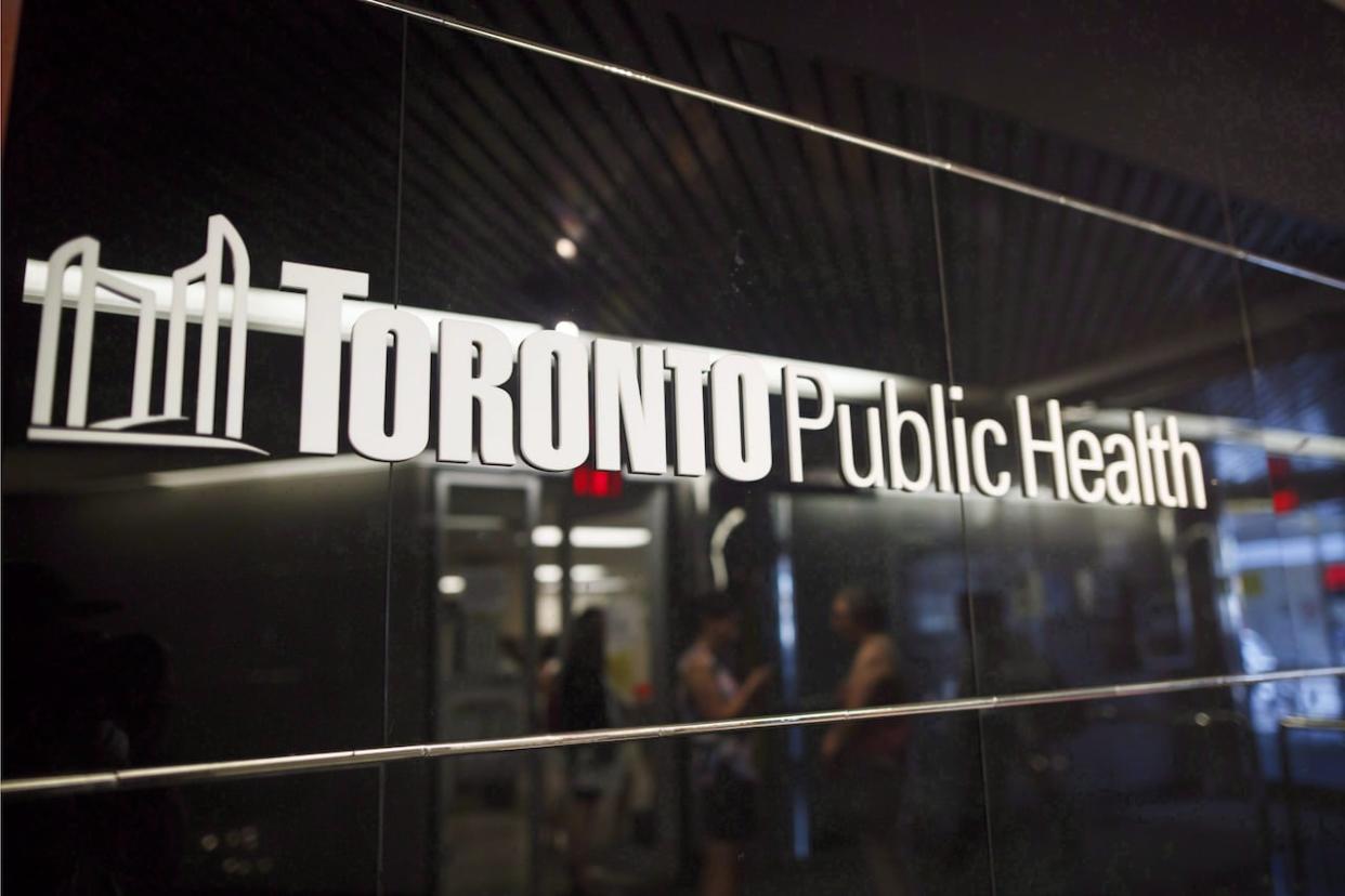 Toronto Public Health is working on a 'deeper data analysis' to help the public health unit track patterns and trends and what has changed since the pandemic hit the city in March. It is working on an updated analysis of how COVID-19 has affected different populations, according to such factors as race and income. Officials will share an update soon. (Cole Burston/The Canadian Press - image credit)