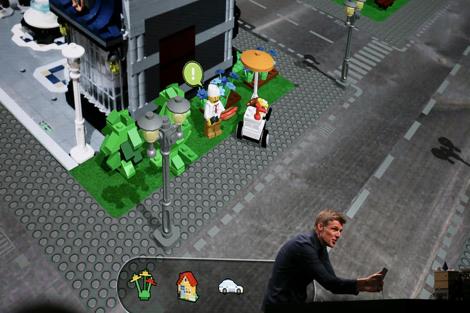 Martin Sanders, Director of Innovation for Lego, talks about augmented reality at the Apple Worldwide Developer conference (WWDC) in San Jose, California, U.S., June 4, 2018.   REUTERS/Elijah Nouvelage - RC1A1AA20F30