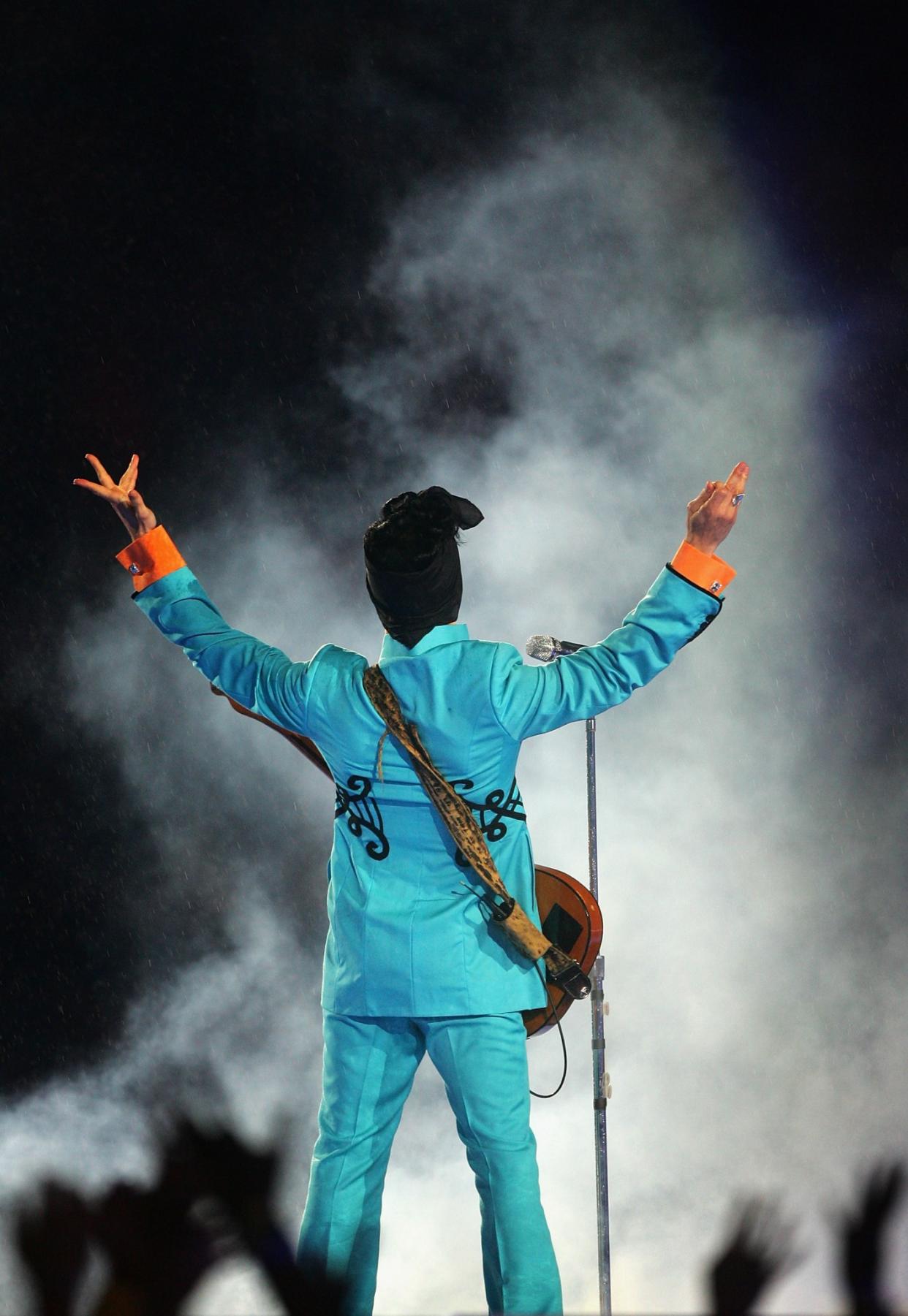 Prince performs during the Pepsi Halftime Show at Super Bowl XLI between the Indianapolis Colts and the Chicago Bears on February 4, 2007, at Dolphin Stadium in Miami. (Photo by Jed Jacobsohn/Getty Images)