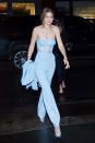 <p>In a light blue, see-through corset in NYC.</p>