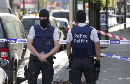 FILE PHOTO: Belgium special forces police secure access during a police operation to search an apartment complex in the Brussels district of Uccle, Belgium, April 12, 2016. REUTERS/Yves Herman/File Photo