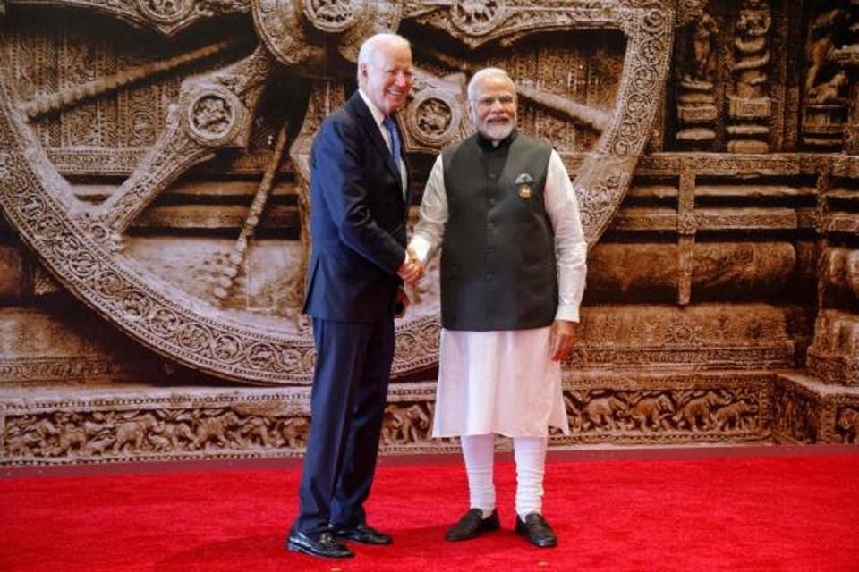 India's PM Modi (right) shakes hand with US President Biden ahead of the G20 Leaders' Summit in New Delhi (POOL/AFP via Getty Images)