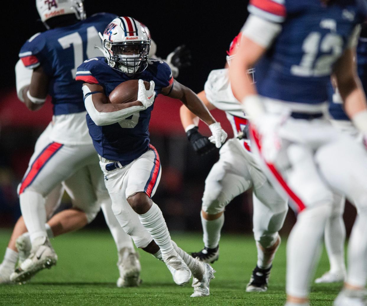 Madison-Ridgeland Academy's running back Charles Simpson (3) runs the ball during the game against the Jackson Prep Patriots at MRA's stadium in Madison, Miss., on Friday, Nov. 10, 2023.