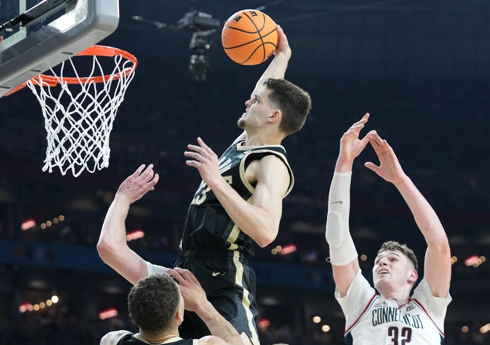 Purdue Boilermakers forward Camden Heide (23) dunks the ball during the NCAA Men’s Basketball Tournament Championship against the Connecticut Huskies, Monday, April 8, 2024, at State Farm Stadium in Glendale, Ariz.