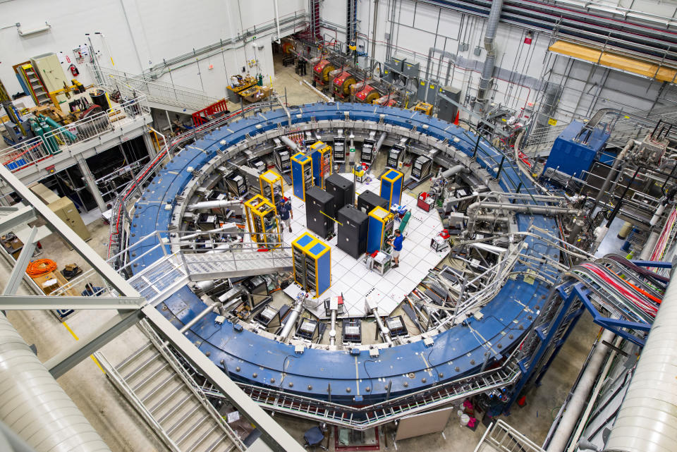 This August 2017 photo made available by Fermilab shows the Muon g-2 ring at the Fermi National Accelerator Laboratory outside of Chicago. It operates at -450 degrees Fahrenheit (-267 degrees Celsius) to detect the wobble of muons as they travel through a magnetic field. Preliminary results published in 2021 of experiments from here and the CERN facility in Europe challenge the way physicists think the universe works, a prospect that has the field of particle physics both baffled and thrilled. (Reidar Hahn/Fermilab via AP)