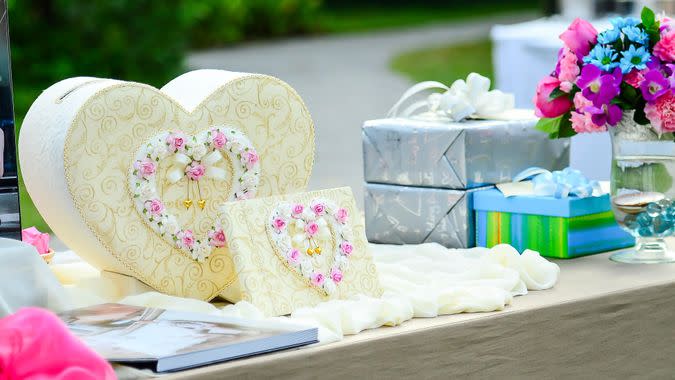 Sweet gift box heart shape on table for wedding day.