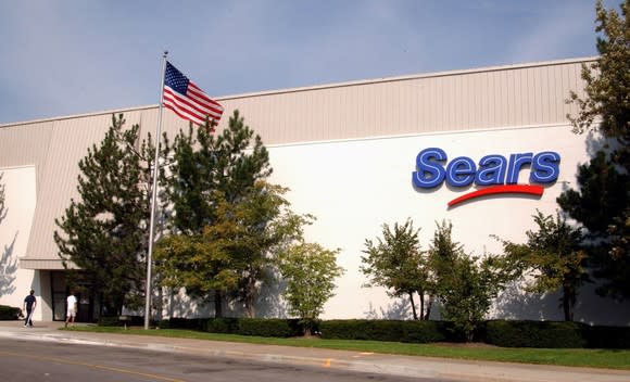 The exterior of a Sears store.