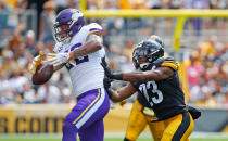 <p>Kyle Rudolph #82 of the Minnesota Vikings cannot come up with a catch while being hit by Mike Mitchell #23 of the Pittsburgh Steelers in the first half during the game at Heinz Field on September 17, 2017 in Pittsburgh, Pennsylvania.. (Photo by Justin K. Aller/Getty Images) </p>