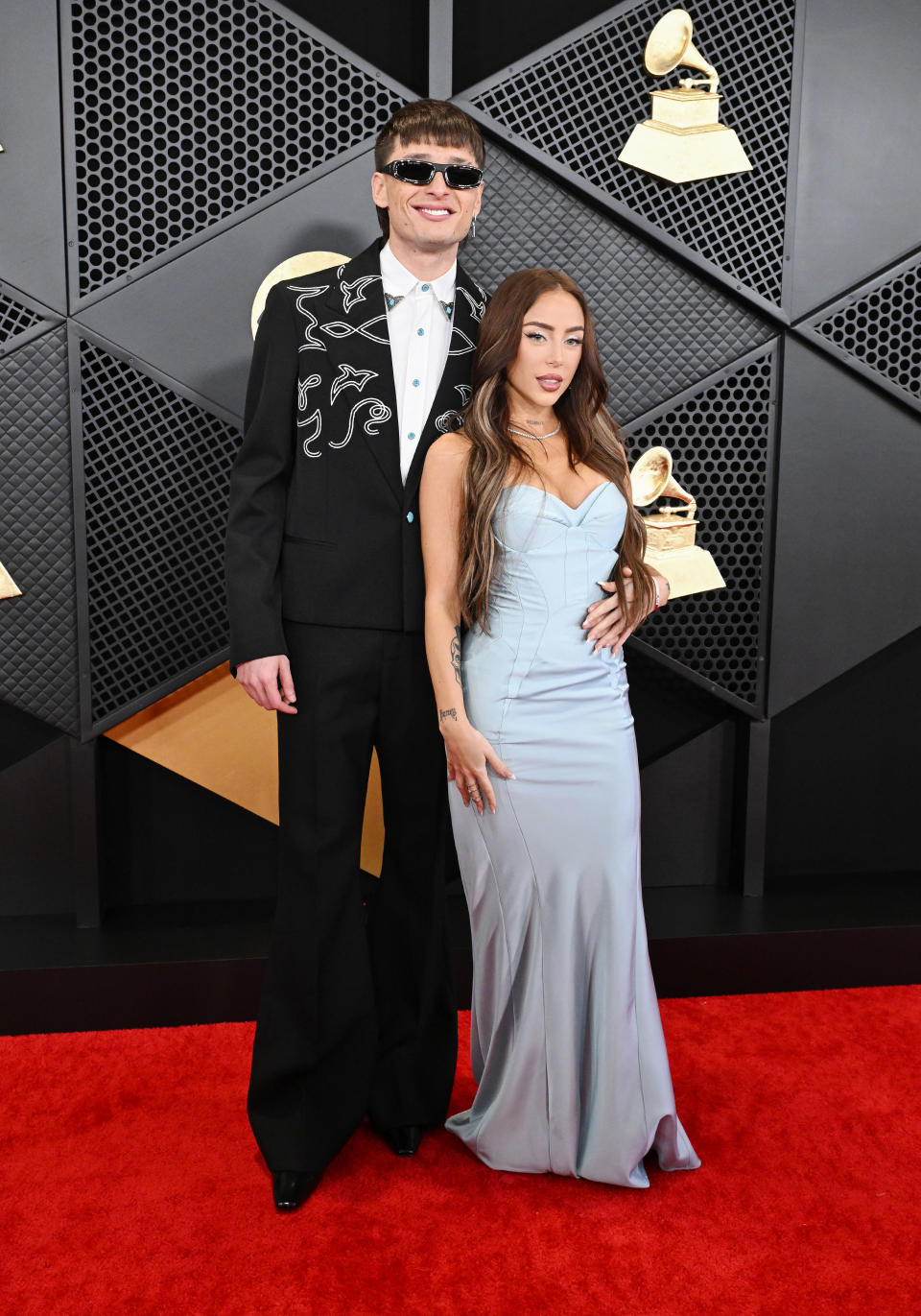 Peso Pluma and Nicki Nicole at the 66th Annual GRAMMY Awards held at Crypto.com Arena on February 4, 2024 in Los Angeles, California. (Photo by Gilbert Flores/Billboard via Getty Images)