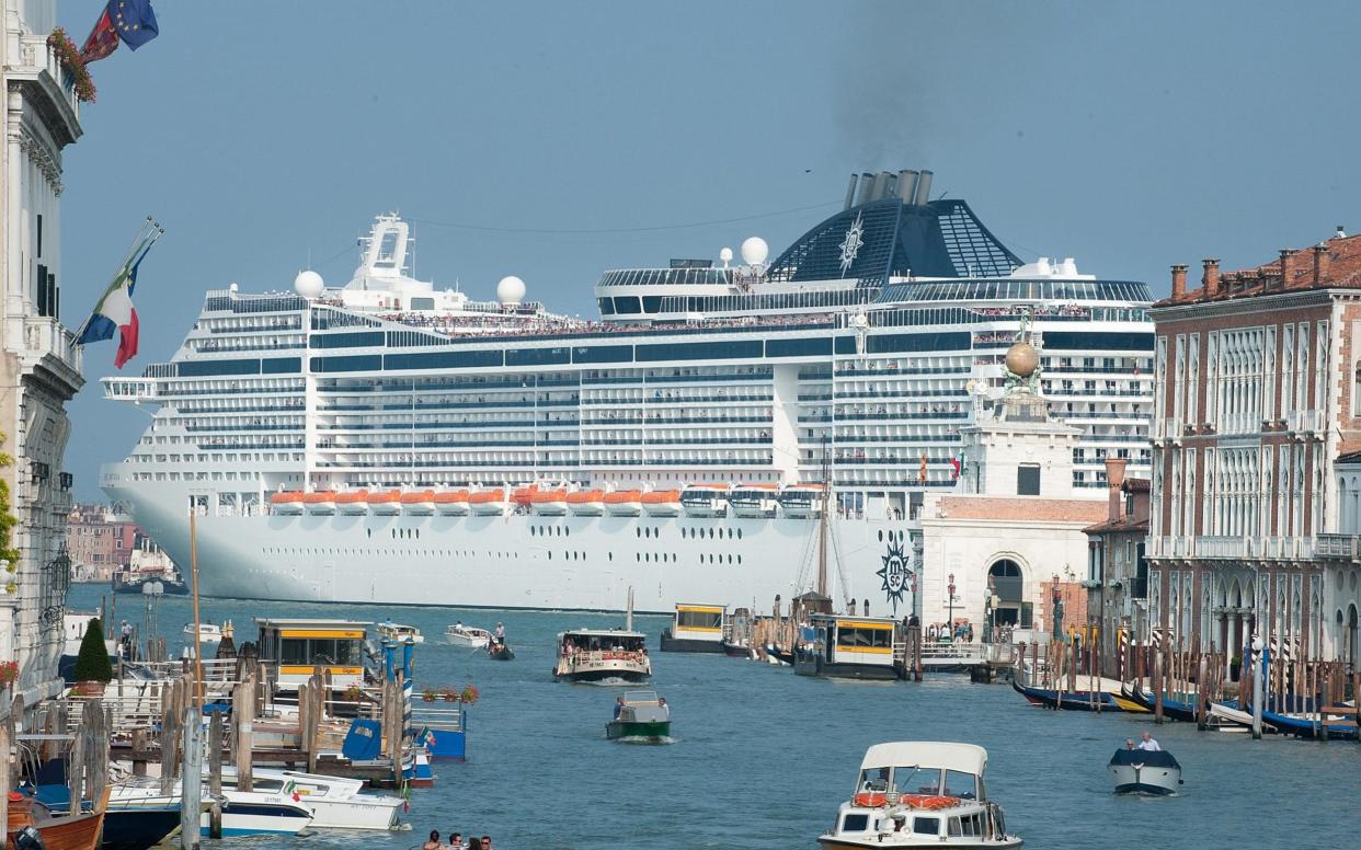 Many Venetians say huge cruise ships should not be allowed to sail so close to the city's historic centre - Getty Images