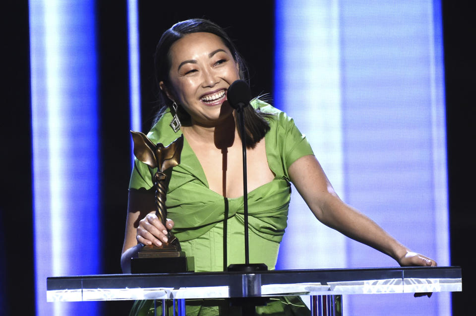 On behalf of Zhao Shuzhen, Director Lulu Wang accepts the award for best supporting female for "The Farewell" at the 35th Film Independent Spirit Awards on Saturday, Feb. 8, 2020, in Santa Monica, Calif. (AP Photo/Chris Pizzello)