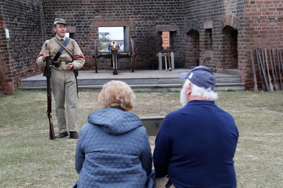 Coastal Heritage Society interpreter Aaron Bradford leads a history program on Dec. 14, 2022 at Old Fort Jackson. A thief broke into the fort on Dec. 10 and stole several of the weapons and uniforms used by the interpreters.