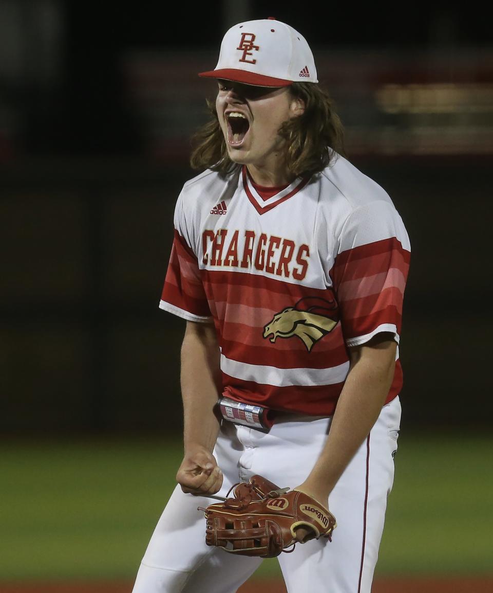 Bullitt East’s Kendall Henson and the rest of the team celebrate winning against Fern Creek in the 6th Region Championship. May 26, 2023