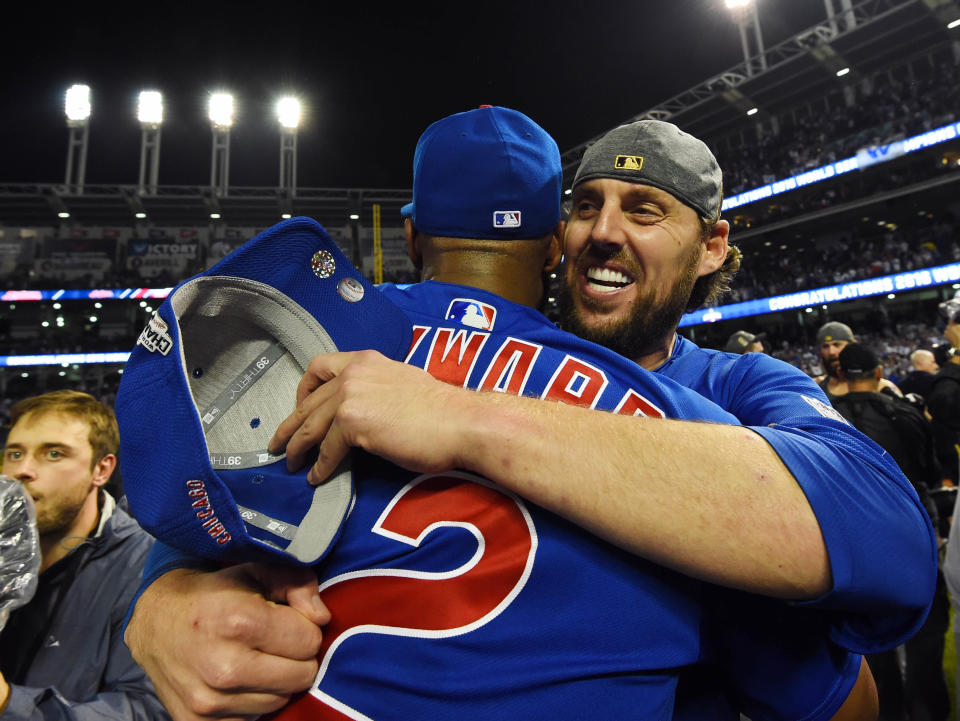 Nov 2, 2016; Cleveland, OH, USA; Chicago Cubs players Jason Heyward (22) and John Lackey celebrate after defeating the Cleveland Indians in game seven of the 2016 World Series at Progressive Field. Mandatory Credit: Tommy Gilligan-USA TODAY Sports