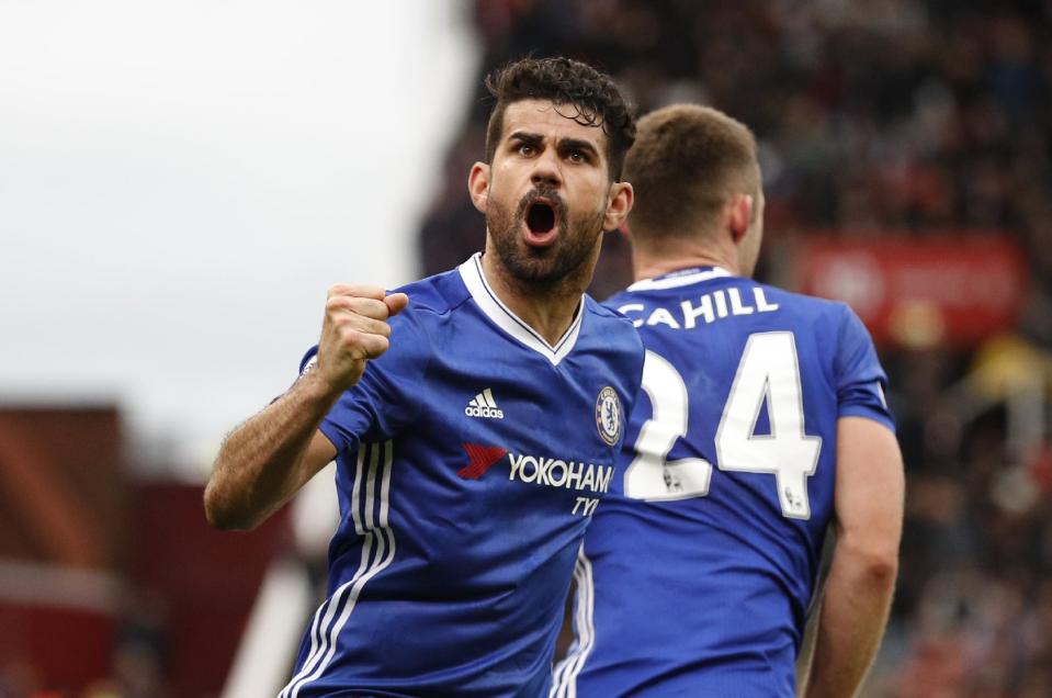 Britain Football Soccer - Stoke City v Chelsea - Premier League - bet365 Stadium - 18/3/17 Chelsea's Gary Cahill celebrates with Diego Costa scoring their second goal Reuters / Phil Noble Livepic EDITORIAL USE ONLY. No use with unauthorized audio, video, data, fixture lists, club/league logos or "live" services. Online in-match use limited to 45 images, no video emulation. No use in betting, games or single club/league/player publications. Please contact your account representative for further details.