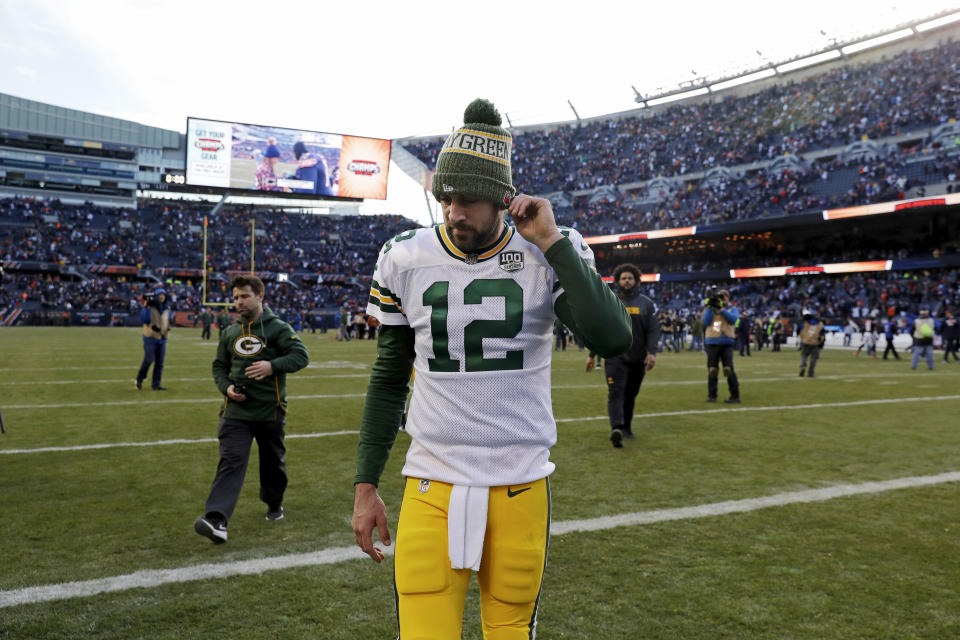 FILE - In this Sunday, Dec. 16, 2018, file photo, Green Bay Packers quarterback Aaron Rodgers walks off the field after a 24-17 loss to the Chicago Bears in an NFL football game in Chicago. Going into this weekend’s game against the New York Jets, Rodgers’ 61.8 percent completion rate was his lowest since his 60.7 rate in 2015, the year that then-top receiver Jordy Nelson was sidelined with a knee injury.  (AP Photo/Nam Y. Huh, File)