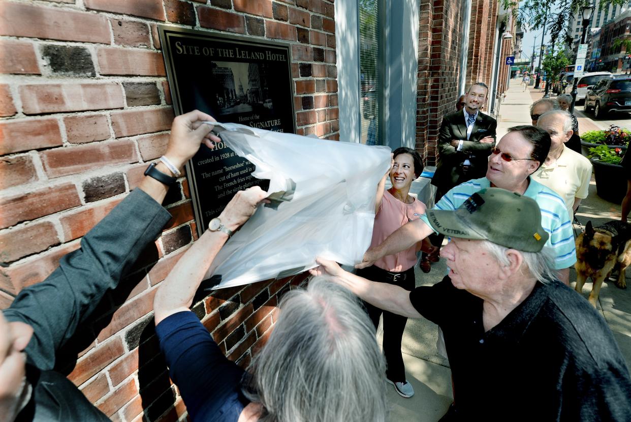 A plaque commemorating the Horseshoe sandwich was unveiled on the Leland building on Thursday, June 20, 2024, in Springfield.