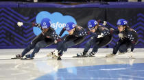 FILE - From left, Maame Biney, Kristen Santos, Corinne Stoddard and Julie Letai compete in the women's 500-meter finals during the U.S. Olympic short track speedskating trials, on Dec. 19, 2021, in Kearns, Utah. The only returning Olympian is Maame Biney, born in Ghana and raised in Virginia . Santos is the lone American skater ranked in the world's top 10 in any event (AP Photo/Rick Bowmer, File)