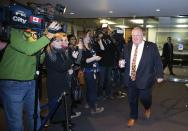 Toronto Mayor Rob Ford walks from his office at City Hall in Toronto, November 14, 2013. Embattled mayor Ford, under huge pressure to quit after he admitted smoking crack cocaine, said on Thursday he was getting help for a drinking problem, but offered no indication that he might step down. Ford also expressed remorse for an obscene outburst he made earlier in the day when denying an allegation he had made sexual overtures to a female member of his staff. REUTERS/Mark Blinch (CANADA - Tags: POLITICS CRIME LAW)