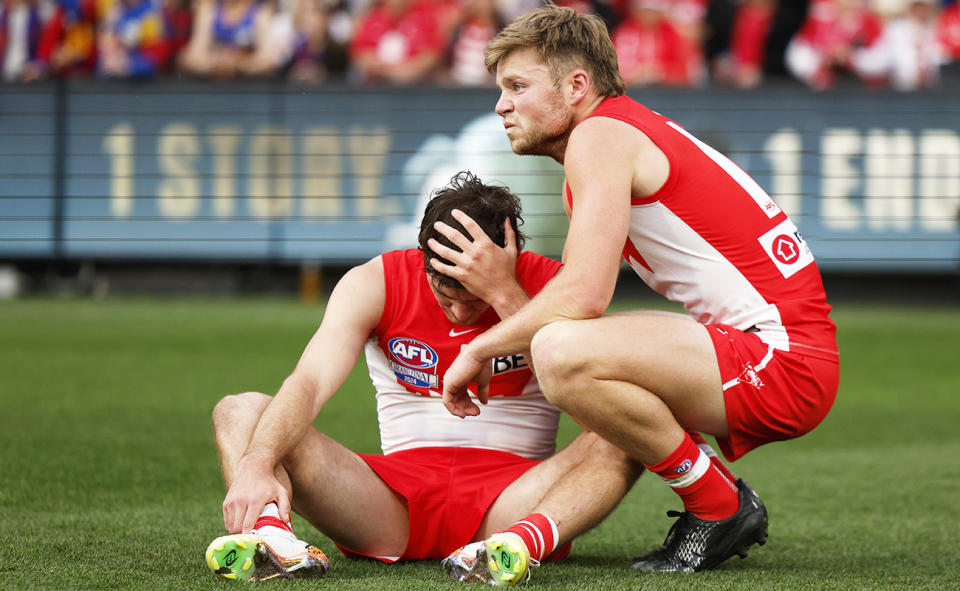 Sydney Swans players, pictured here after the AFL grand final.