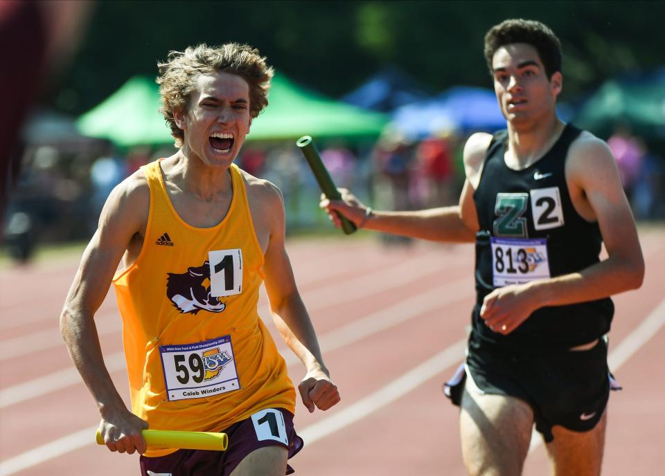 Bloomington North’s Caleb Winders celebrates after winning the 3200 meter relay in a state meet record time of 7:37.24 during the boys’ IHSAA state finals track and field meet at Robert C. Haugh Track & Field Complex in Bloomington, Ind. on Friday, June 2, 2023.