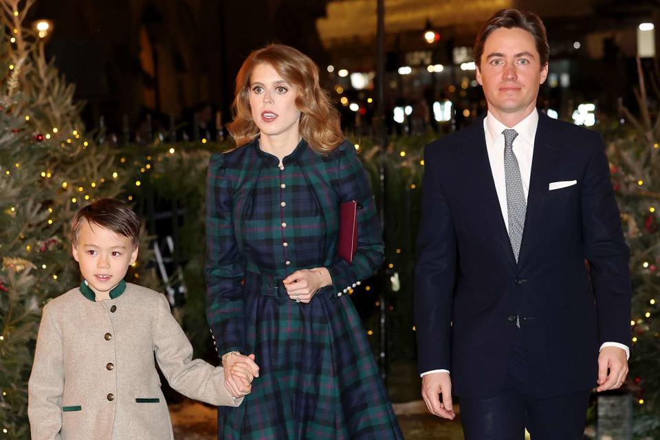 <p>Chris Jackson/Getty</p> Christopher Woolf, Princess Beatrice and Edoardo Mapelli Mozzi attend the Together At Christmas Carol Service at Westminster Abbey on December 8, 2023 