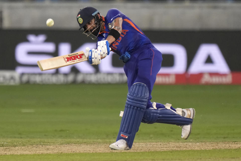 India's Virat Kohli plays a shot during the T20 cricket match of Asia Cup between India and Afghanistan, in Dubai, United Arab Emirates, Thursday, Sept. 8, 2022. (AP Photo/Anjum Naveed)