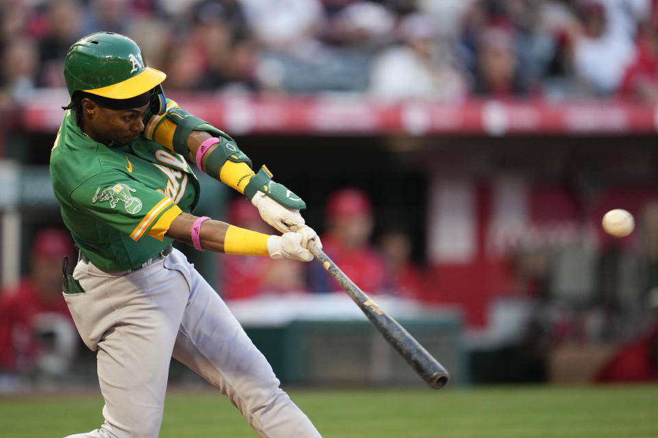 Oakland Athletics' Esteury Ruiz (1) flies out to right field during the second inning of a baseball game against the Los Angeles Angels in Anaheim, Calif., Monday, April 24, 2023. (AP Photo/Ashley Landis)