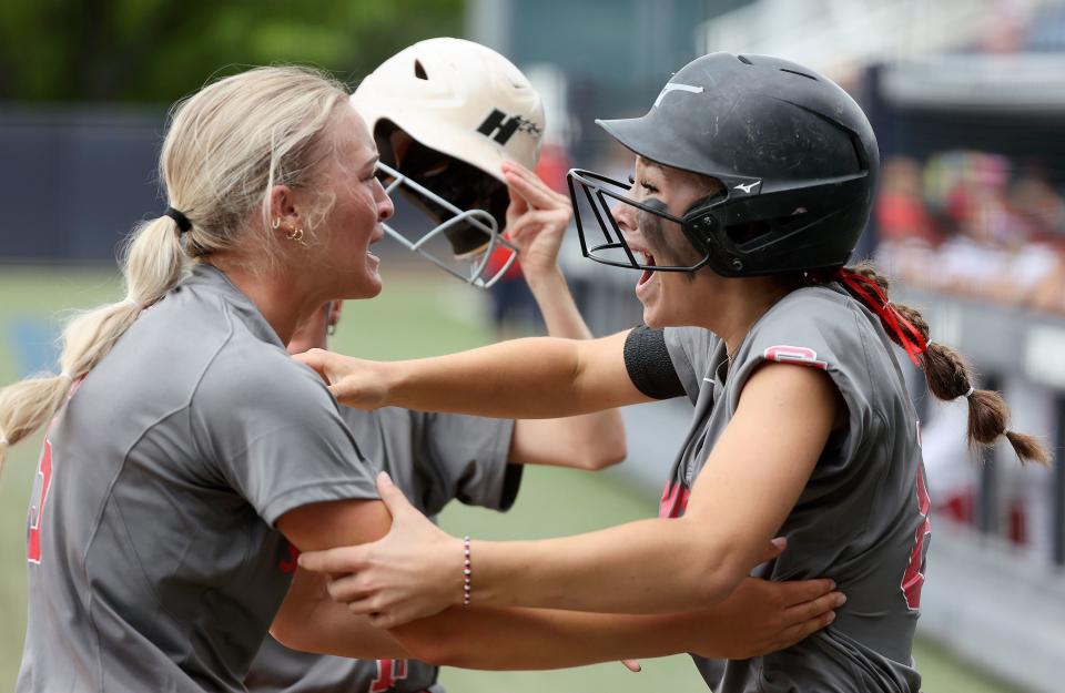 Spanish Fork’s Avery Sapp and Paige Pierce celebrate Pierce’s home run during the 5A softball championship game at the Miller Park Complex in Provo on Friday, May 26, 2023. Spanish Fork won 8-4. | Kristin Murphy, Deseret News