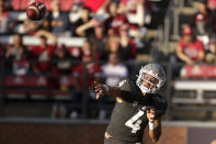 Washington State quarterback Jayden de Laura throws a pass during the first half of the team's NCAA college football game against Stanford, Saturday, Oct. 16, 2021, in Pullman, Wash. (AP Photo/Young Kwak)