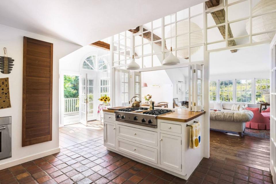 a kitchen with white cabinets