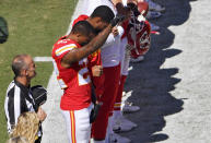 <p>Kansas City Chiefs cornerback Marcus Peters raises his fist in the air during the national anthem before an NFL football game against the San Diego Chargers on Sunday, Sept. 11, 2016, in Kansas City, Mo. (John Sleezer/The Kansas City Star via AP) </p>