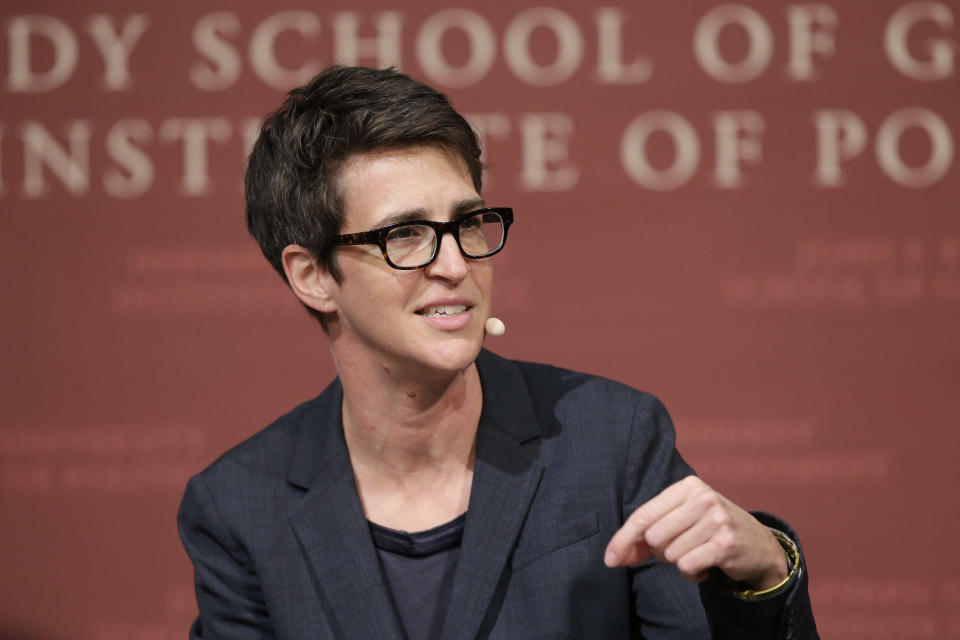 FILE - In this Oct. 16, 2017 file photo, MSNBC television anchor Rachel Maddow, host of the Rachel Maddow Show, moderates a panel at a forum called "Perspectives on National Security," at the John F. Kennedy School of Government, at Harvard University, in Cambridge, Mass. Time's Up has called on NBC Universal to release all former employees from non-disclosure agreements that might be impinging on their ability to speak out about sexual harassment, and also to hold an independent investigation into workplace culture at NBC. The organization said NBC didn't go far enough with its statement, first reported Friday, Oct. 25, 2019, by Maddow, that employees should contact the company in order to be released from any "perceived obligation" to remain quiet. (AP Photo/Steven Senne, File)