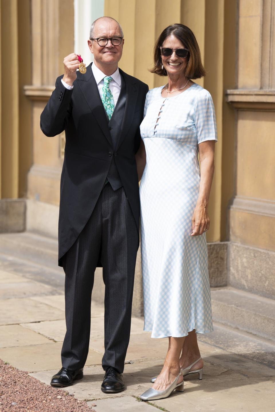 Sir Patrick Vallance after he was made a Knight Commander, with his wife Sophie Dexter (Kirsty O’Connor/PA) (PA Wire)