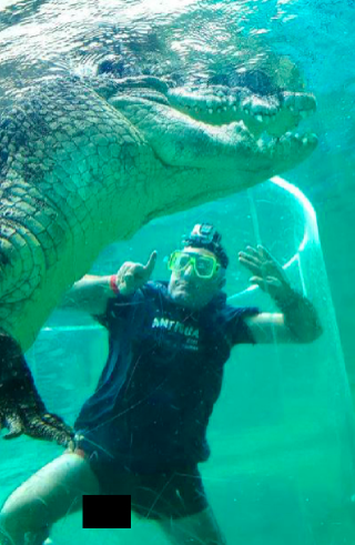 John's shorts didn't quite do the job during his croc dive. Photo: Supplied