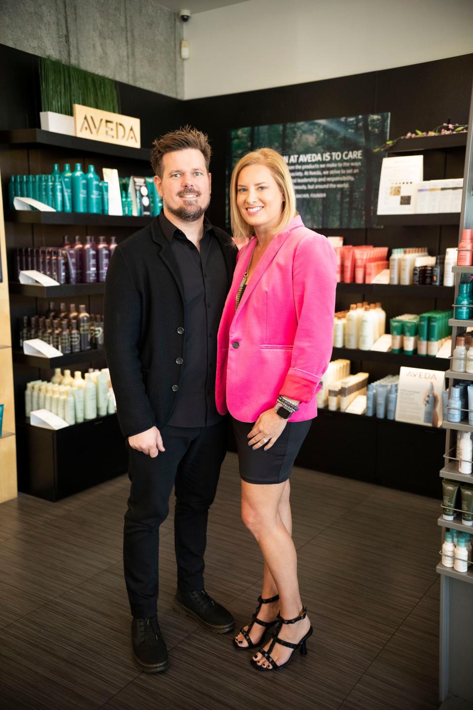 Chris and Jenny Knudsen, owners of Mane Attraction, pictured at their hair salon.