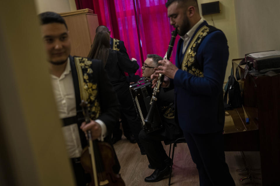 Ukrainian folk musicians rehearse prior at backstage before performing at a concert with Ukrainian singer Jamala at the National Opera in central Kyiv on Friday, May 5, 2023. Jamala won the Eurovision Song Contest in 2016 with a song about the deportation of Crimean Tatars. Fast forward to this Eurovision week and she's launching a new album, filled with more stories about her ancestors. (AP Photo/Bernat Armangue)