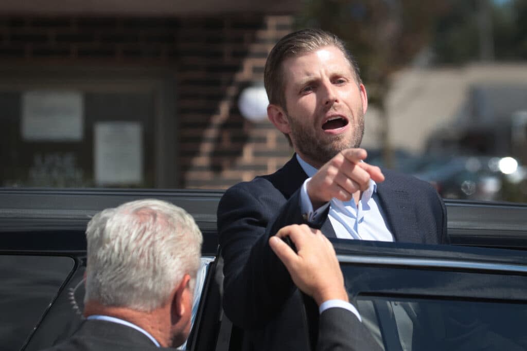 Eric Trump, the son of former President Donald Trump, greets a small number of supporters outside of the Milwaukee Police Association hall in Milwaukee, Wisconsin, where he spoke on August 18, 2020. (Photo by Scott Olson/Getty Images)