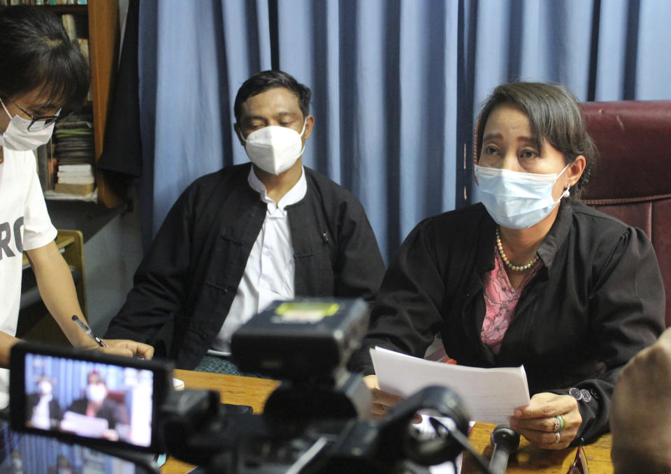 Min Min Soe, right, and Thae Maung Maung, left rear, both lawyers assigned by the National League for Democracy party to represent deposed Myanmar leader Aung San Suu Kyi, meet journalists in Naypyitaw, Myanmar, Monday, June 21, 2021. As the trial of ousted leader Aung San Suu Kyi entered its second week, her lawyers said prosecution witnesses testified about charges that she had illegally imported and used walkie-talkies for her bodyguards, and along with Win Myint, president in her government, had flouted laws on public gatherings that were meant to combat the spread of COVID-19. (AP Photo)