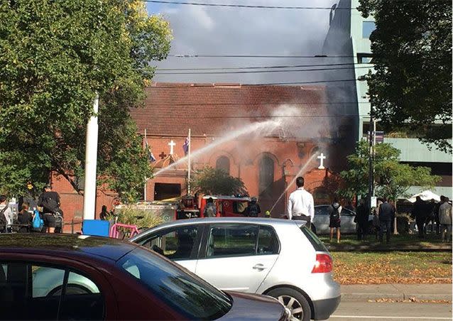 A fire is now under control at the Greek Orthodox church, Holy Annunciation of Our Lady, on the corner of Lansdowne Street and Victoria Parade in East Melbourne. Picture: 7 News viewer Bella Mikhaeel