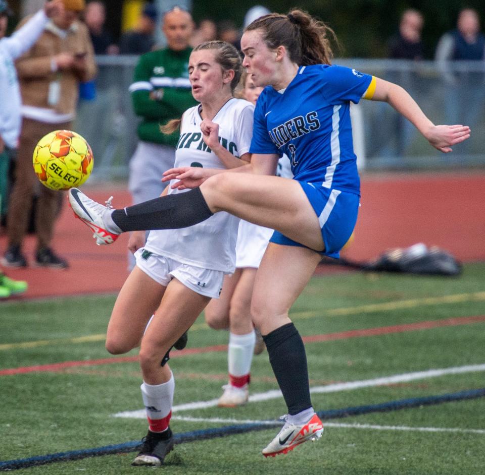 Dover-Sherborn Regional High School captain Tessa Broderick with a kick against Nipmuc, Oct. 17, 2023.